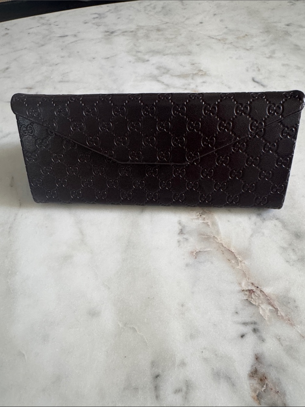 Gucci Brown Embossed
Leather GG Tri-Fold
Sunglasses Case